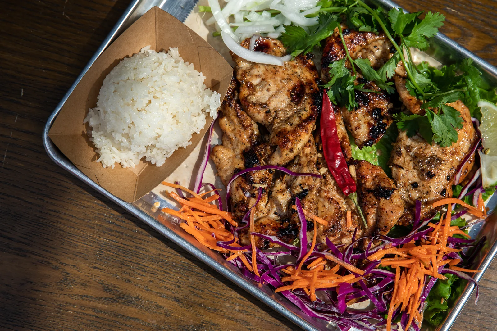 Grilled Thai chicken with sticky rice and slaw at Bangkok 96 in Detroit