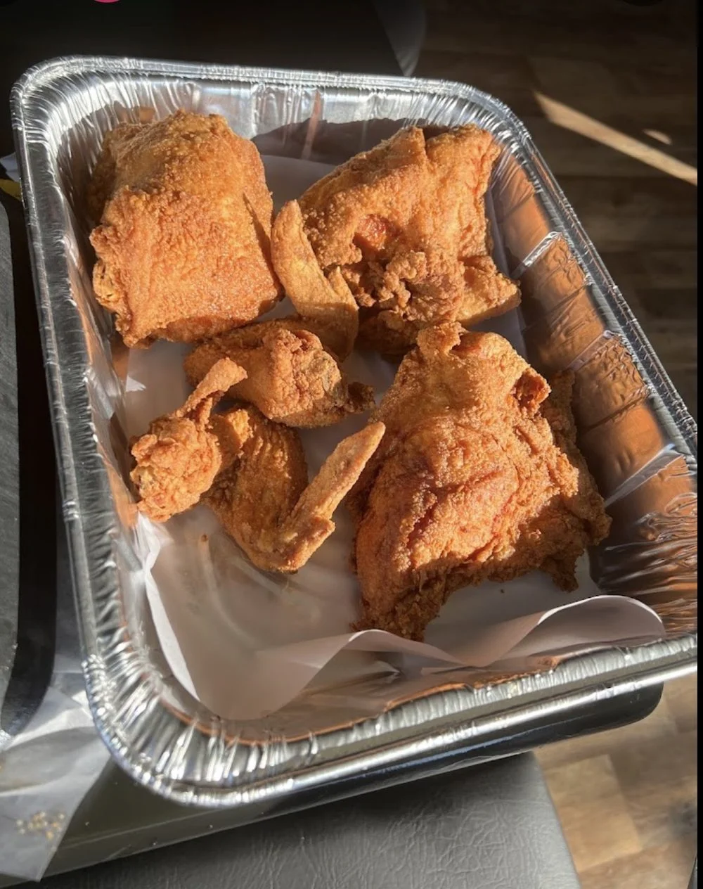 Golden Southern fried chicken in a tray