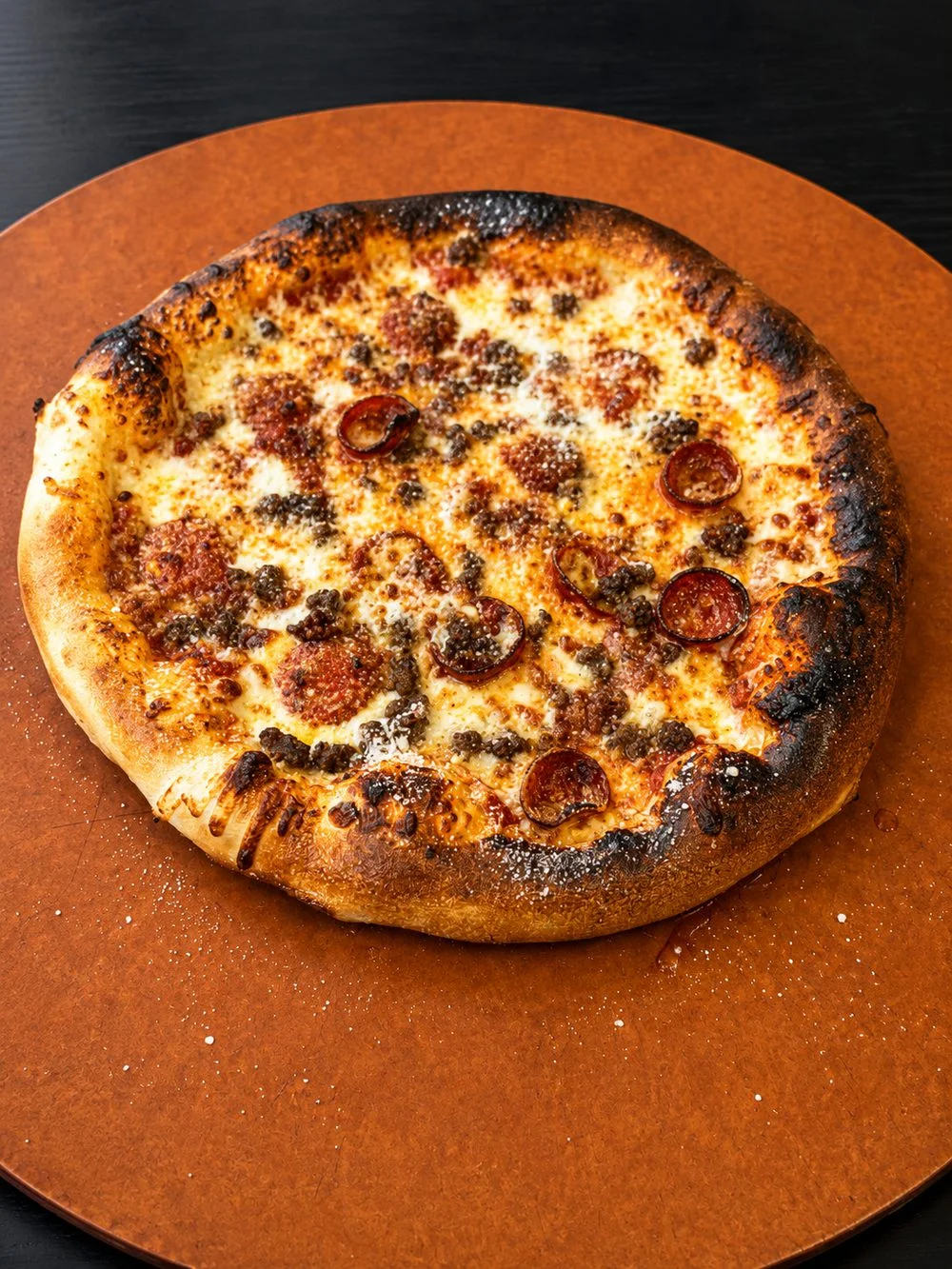 Meat pie with bacon, beef, pepperoni and sausage