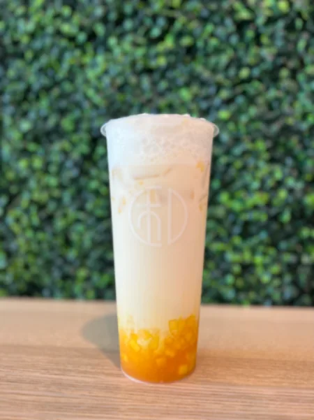 Mango jasmine green milk tea w. cheese foam