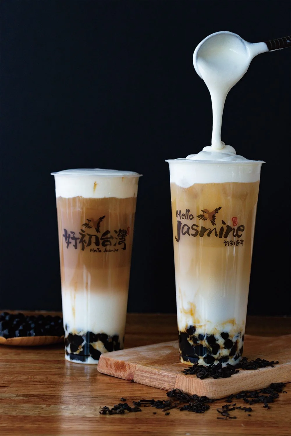 Brown sugar boba milk tea being poured