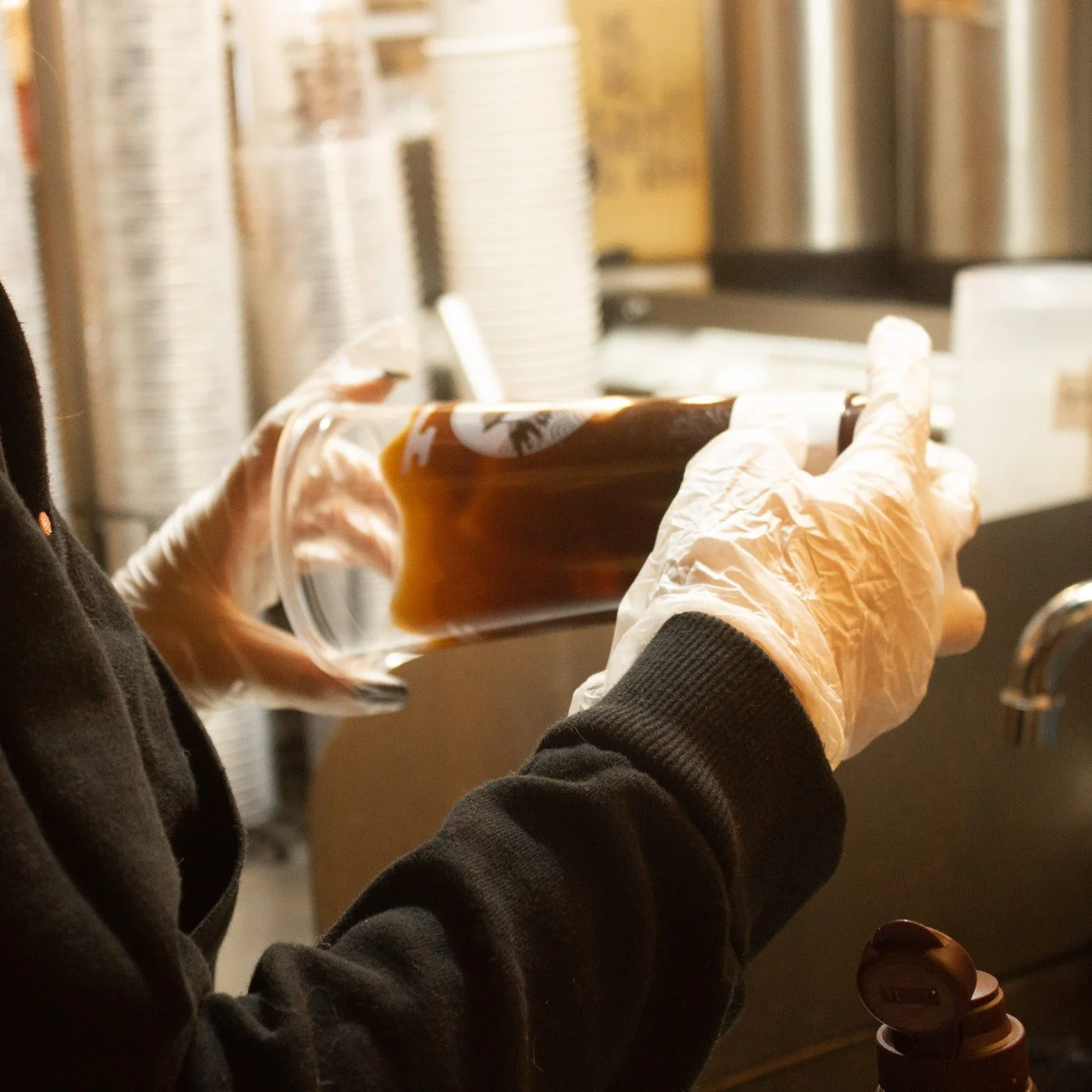 Staff preparing fresh boba tea at Hello Jasmine