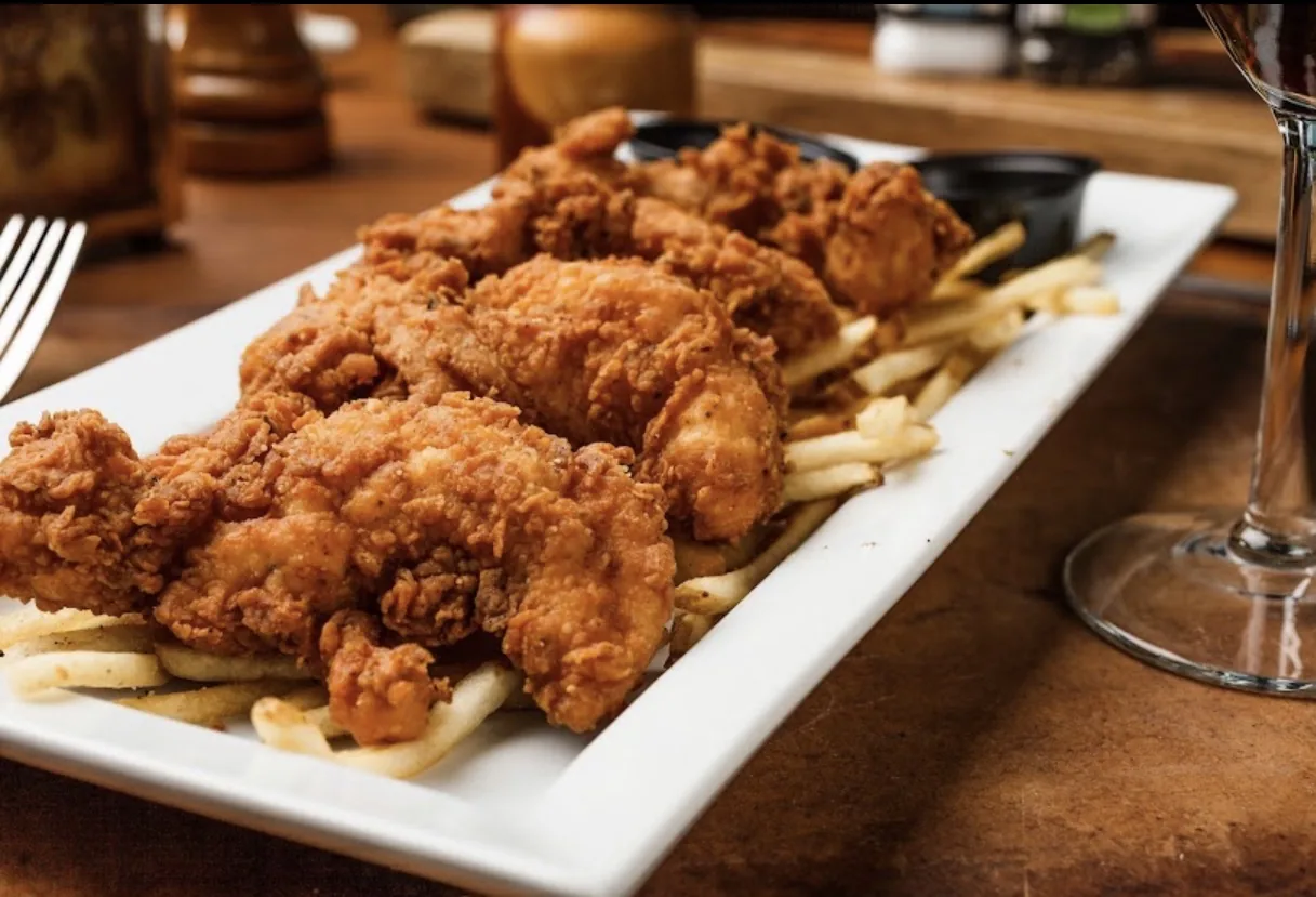Roberta’s Prime — fried chicken tenders over fries