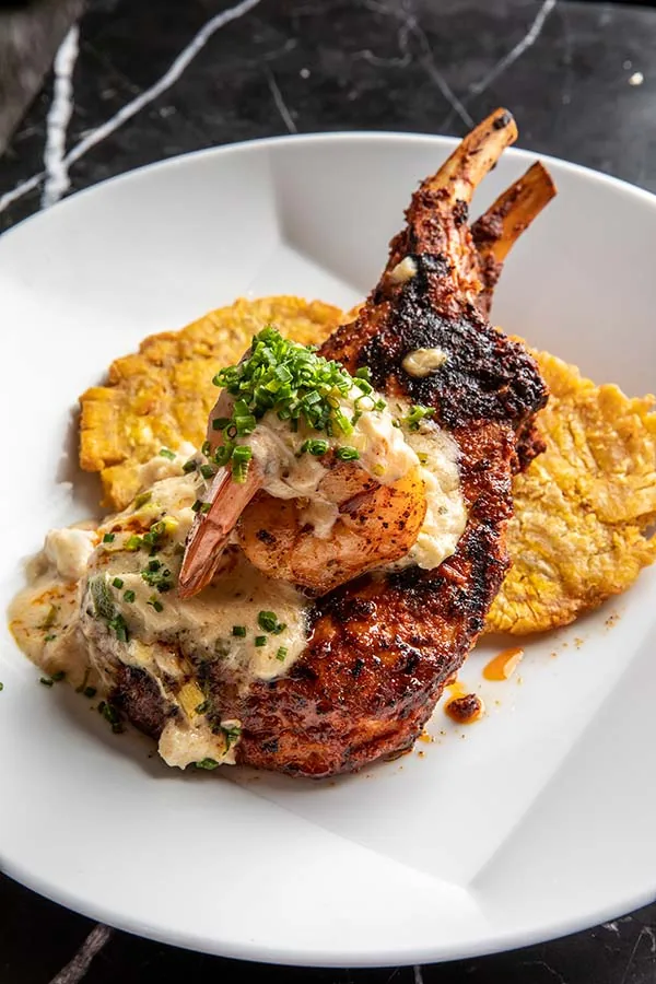 Roberta's Prime — pork chop over grits