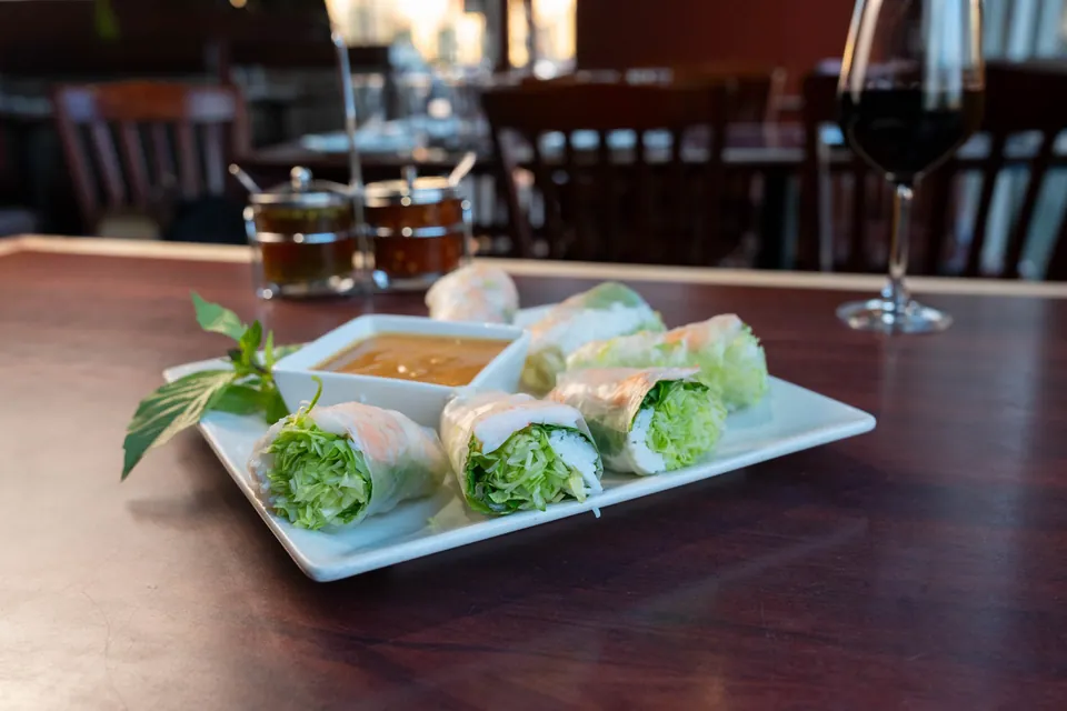 Fresh rice paper rolls served with peanut sauce