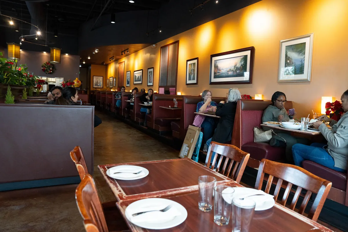 Dining tables set for guests at Simply Thai in Tukwila