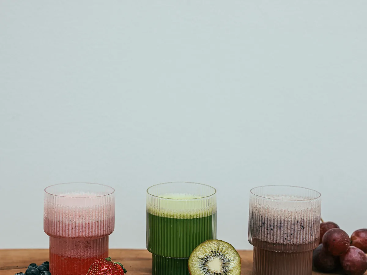 Real-fruit blended drinks lined up on the counter