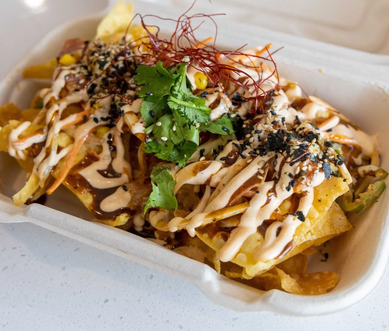 The Poki nachos loaded with fresh poke